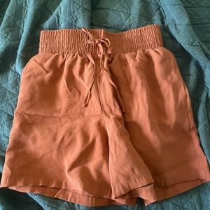 High-waisted dressy burnt orange shorts